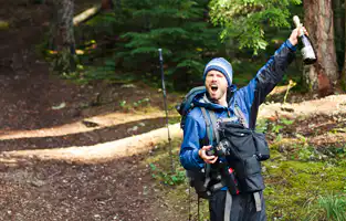 Jake celebrates hiking all of Glacier National Park's trails in one summer